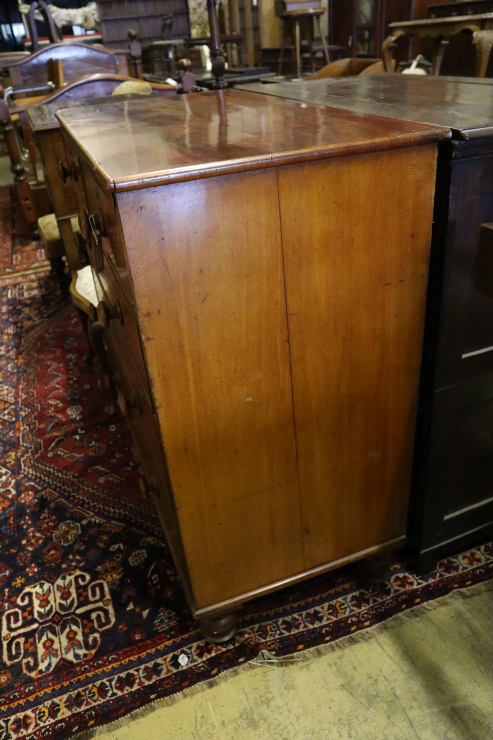 A Victorian mahogany chest fitted two short drawers and three long drawers, on bun feet, width 106cm depth 53cm height 105cm